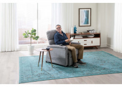 lifestyle pr535 anchor man seated with reading glasses and book  32